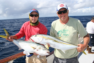 The Olson brothers, Ken [L] of Newbury Park, and Rob of Tacoma, WA, are not twins, but their yellowtail caught aboard the American Angler might be.