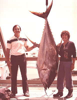 Bud and Harriet Einstoss with a huge tuna that Bud caught on a long range trip.